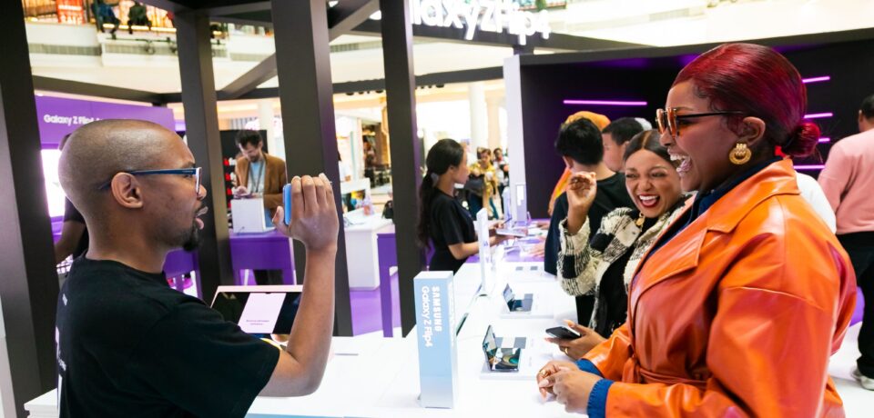customer-shopping-for-mobile-phone-in-retail-store-2026-01-07-07-12-14-utc (1)