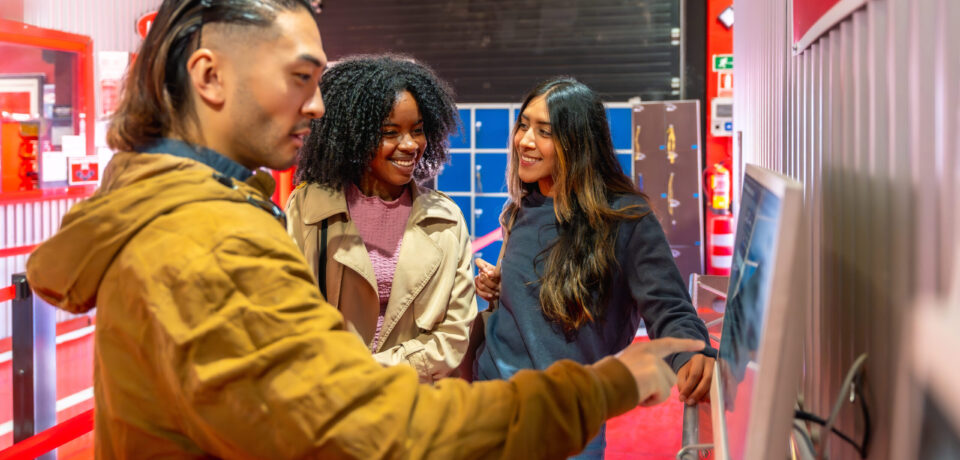 friends-exploring-an-interactive-museum-exhibit-to-2026-03-05-11-49-52-utc (1)