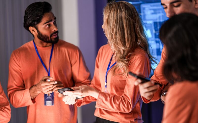 team-of-professionals-in-orange-uniforms-collabora-2026-05-14-17-31-39-utc (1)