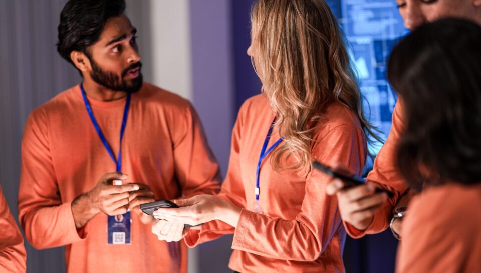 team-of-professionals-in-orange-uniforms-collabora-2026-05-14-17-31-39-utc (1)